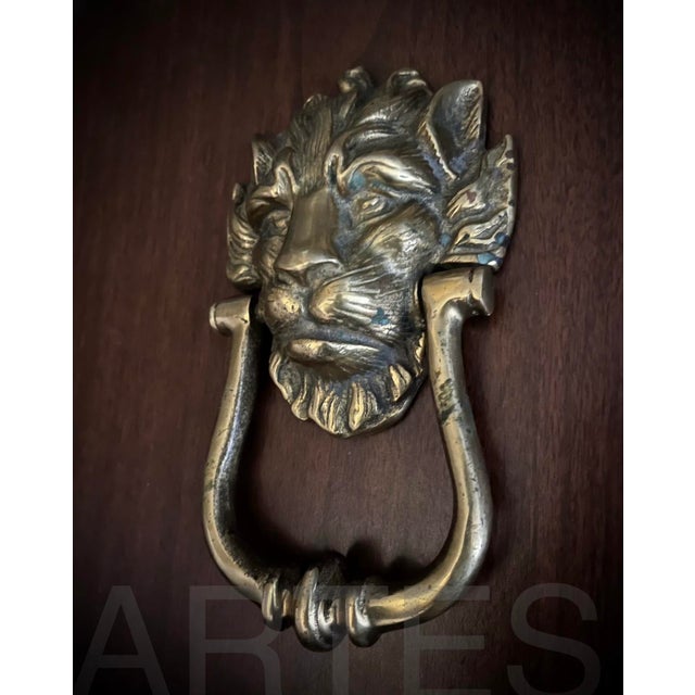 This striking English lion door knocker will always make for a grand and sophisticated entrance. The solid cast brass door...