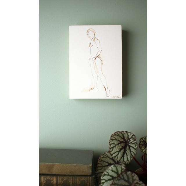 Original pen and walnut ink drawing of a seated female nude by contemporary artist Michelle Arnold Paine. The drawing on...