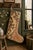 Hand-cut from a genuine vintage Turkish wool kilim, this stocking showcases a warm camel and rust ground with a delicate...