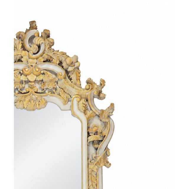 This exquisite 19th-century Italian mirror brings Venice's opulent grandeur to your space. Hand-carved by skilled...