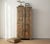 Add stylish storage to the kitchen, dining room, or linen storage area with this farmhouse solid mango wood kitchen pantry...