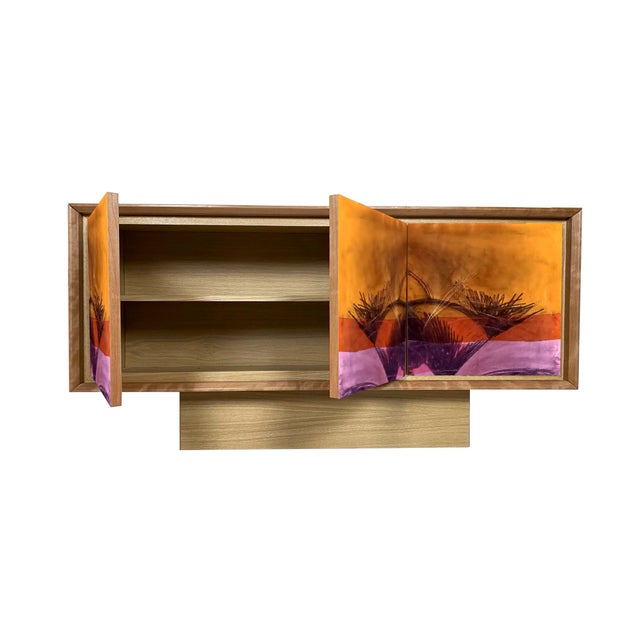 "Disegno Undici" sideboard, 2026, by Meccani Studio for Meccani Design. A beautiful oak sideboard with cherry and walnut...