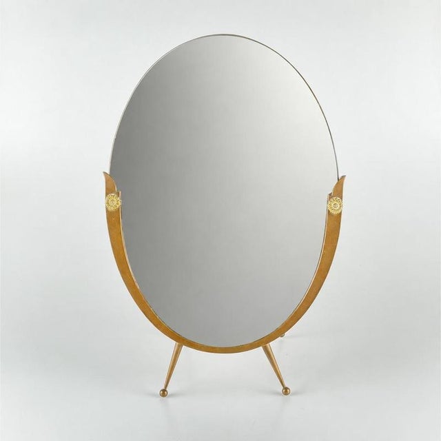 An exceptionally elegant Italian vanity mirror from the 1950s, attributed to Gio Ponti. Refined, architectural and full of...