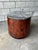 Striking 1950s cylindrical drum table and compact bar cabinet in the manner of Harvey Probber, featuring richly figured...