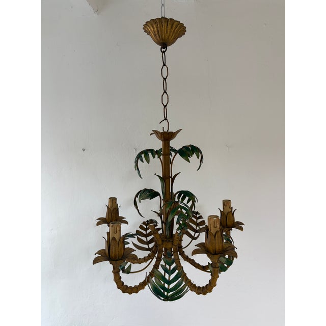 Housing five lights. Rewired with sockets appropriate to country and ready to hang. We use certified US UL sockets for the...