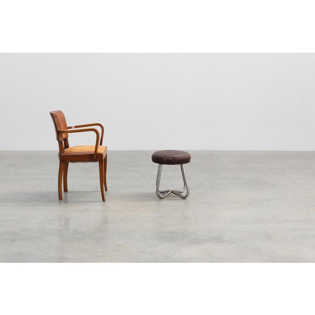 This striking Bauhaus‑era stool, crafted in Germany circa 1920, embodies the movement’s revolutionary approach to form and...