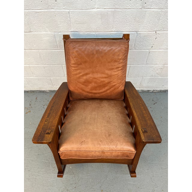 Bring timeless craftsmanship and architectural beauty into your home with this Mission Oak chair by Southern Furniture...