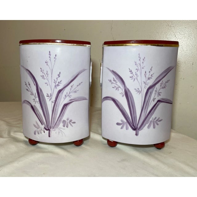 Up for sale is a very nice quality pair of antique 19th century French porcelain vases. They're done with very elaborate...