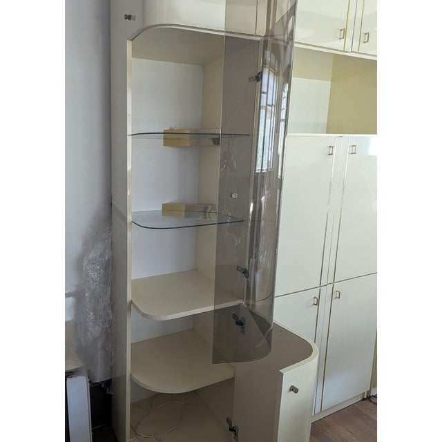 Striking 1980 glam 3 piece wall unit with backlit shelves and ample storage. This versatile contemporary cabinet in cream...