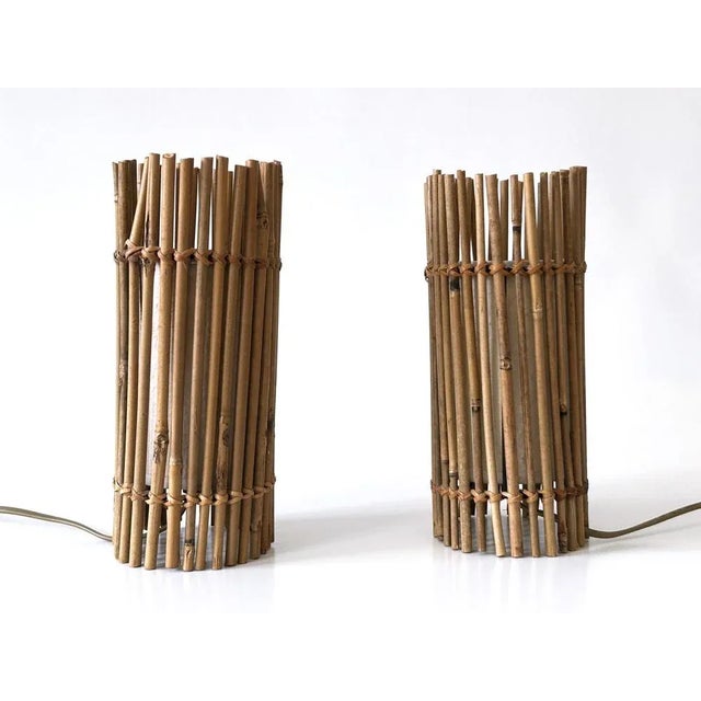 Set of two lovely and highly decorative bedside table lamps in the style of louis sognot. Manufactured probably in...