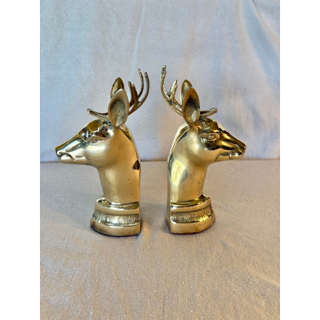 This pair of Mid 20th Century Stag Deer Bookends were created from brass by artist Jack Housman. The bookends feature a...