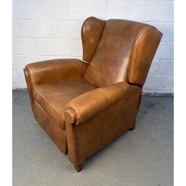 Mid-Century style Wing-Back Reclining Lounge Chair with a timeless silhouette and comfortable, ergonomic design....