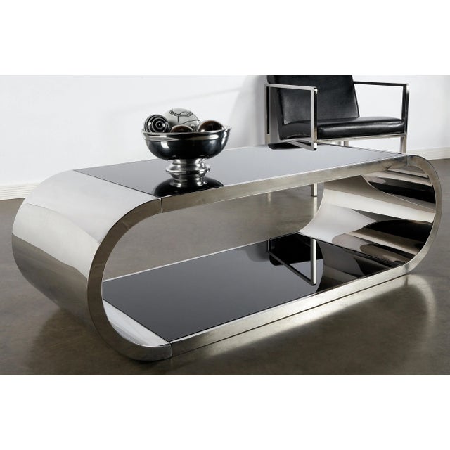 New modern coffee table with dark tinted glass panels and silvered steel. Materials : Stainless steel, dark tint glass...