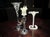 This set of three Murano blown glass candlesticks represents an elegant expression of Venetian glassmaking art. These...