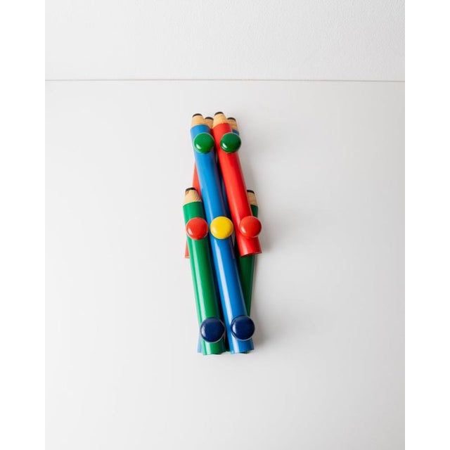 Add a bold touch of retro charm with this vintage Pierre Sala wardrobe. Featuring a playful pencil design and seven knobs,...