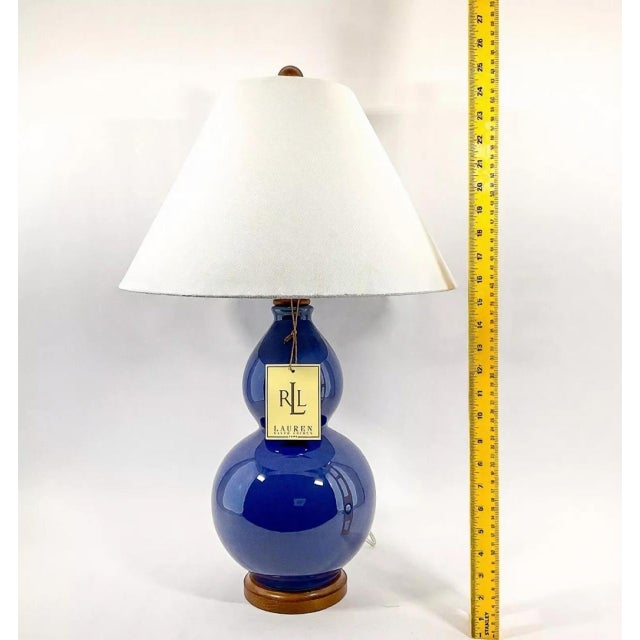 Add timeless elegance to your home with this stunning Ralph Lauren Home table lamp. Featuring a classic double...