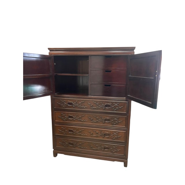 Constructed from solid elmwood with traditional joinery techniques, this armoire was created for long lasting durability....