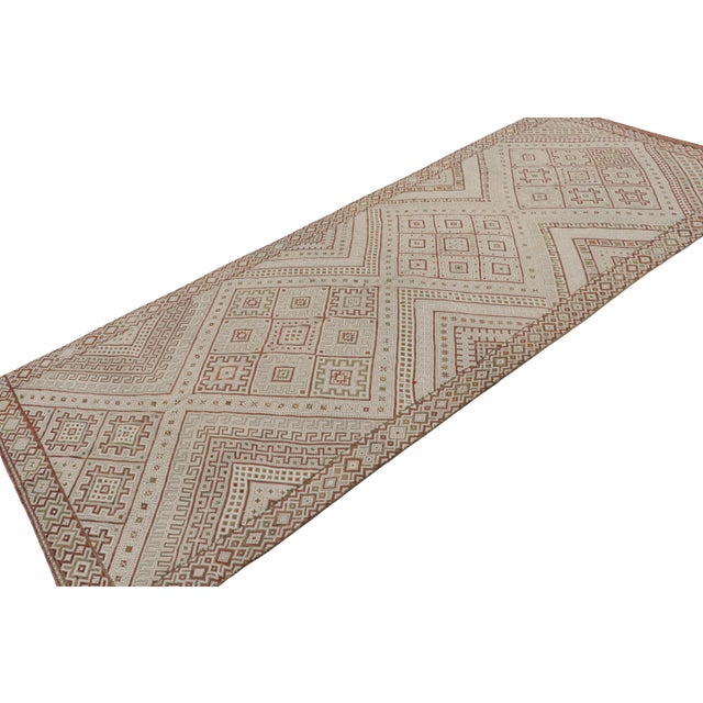 Handwoven in wool, a vintage 6x14 Zayane Moroccan Kilim—believed to originate from the Middle Atlas mountain range in...
