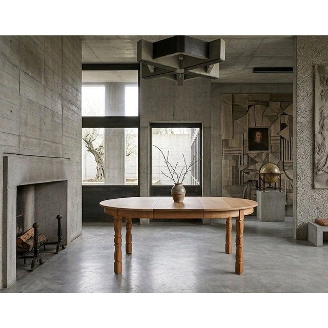 Danish brutalist dining table designed by Henning Kjærnulf in the 1960s. Crafted in solid oak with a bold, sculptural...