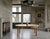 Danish brutalist dining table designed by Henning Kjærnulf in the 1960s. Crafted in solid oak with a bold, sculptural...