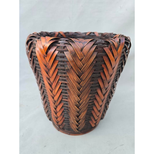 This is a nice size ikebana woven basket that could be used a planter or a waste basket. This could provide the perfect...