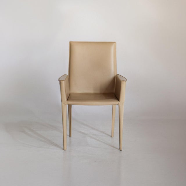 A masterpiece of Italian leatherwork, the Bottega chair is a tribute to the "saddle hide" tradition of Udine. Designed by...