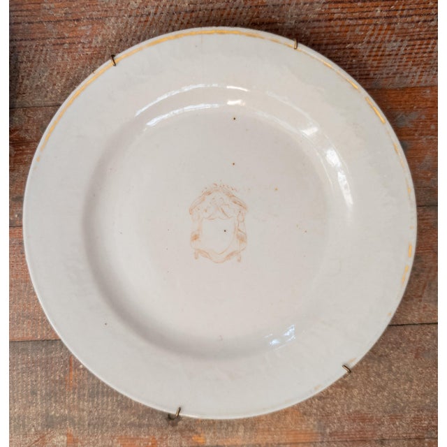 We are selling this rustic pair of decorative Chinese export armorial plates with simple decoration. Condition: Heavy...