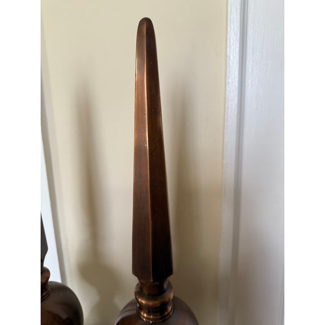 These solid copper finials would be such versatile objects for any home. They come as a pair which is nice for a fireplace...