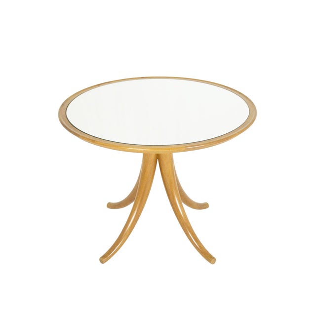 A fine and rare coffee table made from walnut and mirrored glass top attributed to the early Fontana Arte production....