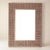This handcrafted cane-framed wall mirror is a sculptural nod to the intersection of natural form and refined function....