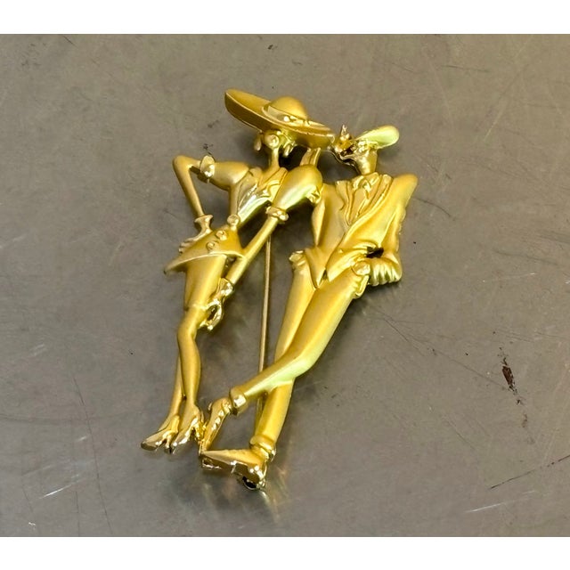 1990s postmodern large gold-tone man/woman figure brooch. Excellent condition.