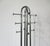 Sculptural chromed coat and hat rack with peg styled holders mounted on the curved upper top of this very well crafted...