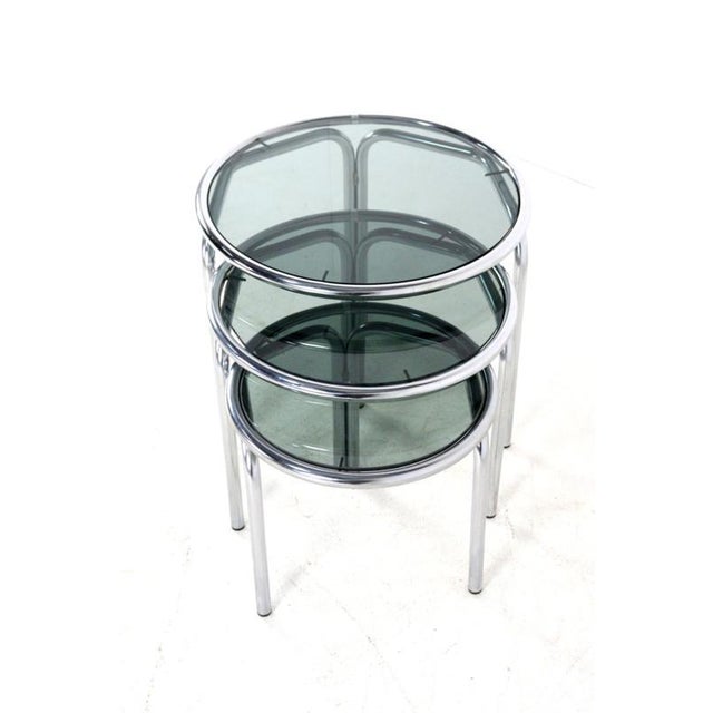 Bring distinctive Italian elegance and vintage flair into your home with this beautiful set of three nesting tables from...
