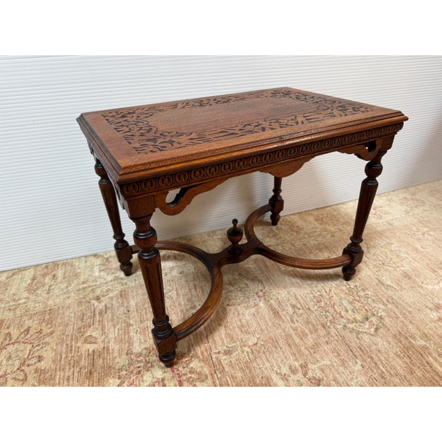 Design Plus Gallery presents an Antique Side Table of the French Louis Style. The side table has a nice grain showing off...
