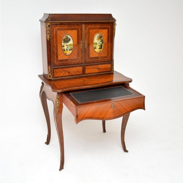 A stunning antique French writing table, also known as an escritoire. This dates from around the 1930’s. It is has a very...