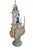 Multi-tiered assemblage art shrine or altar. It incorporates a wide variety of religious and symbolic elements,...