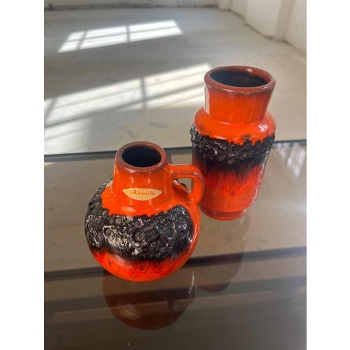 This set of two Fat Lava vases from Kreutz Keramik brings the raw energy of West German pottery directly into your home....
