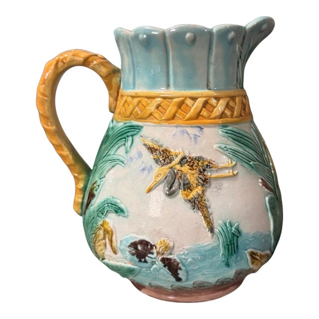 Antique Victorian Majolica 7.5" Pitcher With Heron Flying Over a Pond Setting For Sale