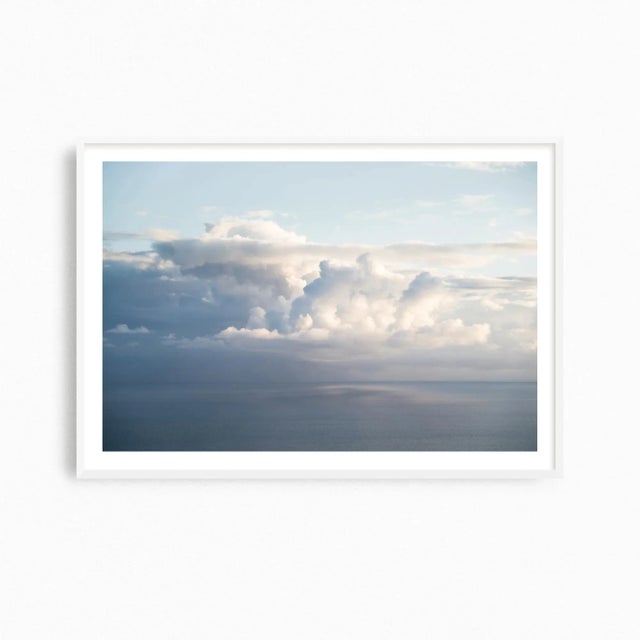 Storm clouds passing over the Ionian Sea is the subject of this seascape art photograph from Kefalonia, Greece. A fine art...
