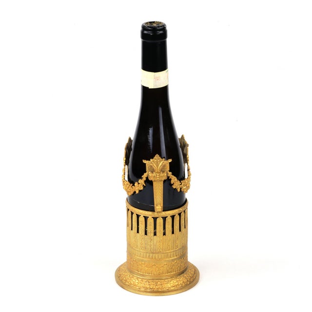 Wine rack made of gilded metal Louis XVI style, first half of the 19th Century.