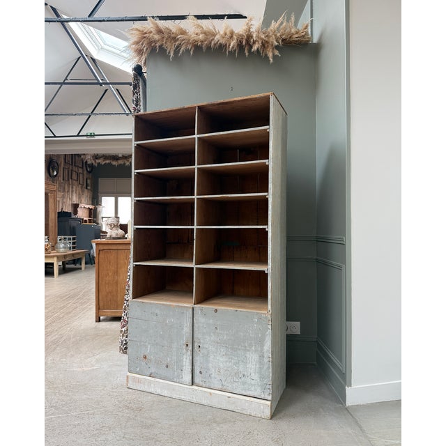 Antique workshop cabinet dating from the 1940s-50s. With its numerous open compartments and particularly pronounced...