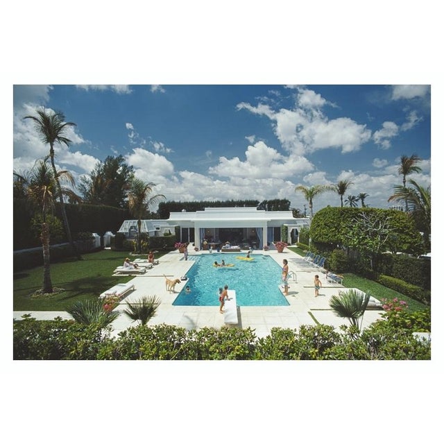 Goodman’s Pool 1985 Family and friends in and around the pool at the home of Murray H. Goodman and his wife, Palm Beach,...