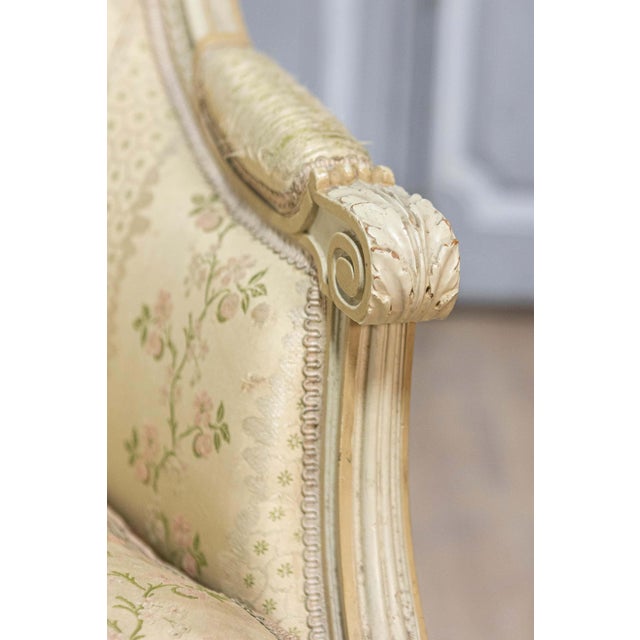 Wood Pair of French Louis XVI Style 1900s Painted and Carved Bergères à Oreilles For Sale - Image 7 of 12