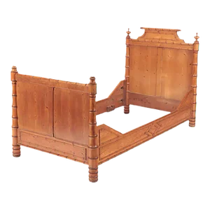A Maple and Birdseye Maple French Faux Bamboo Daybed. Circa 1880.