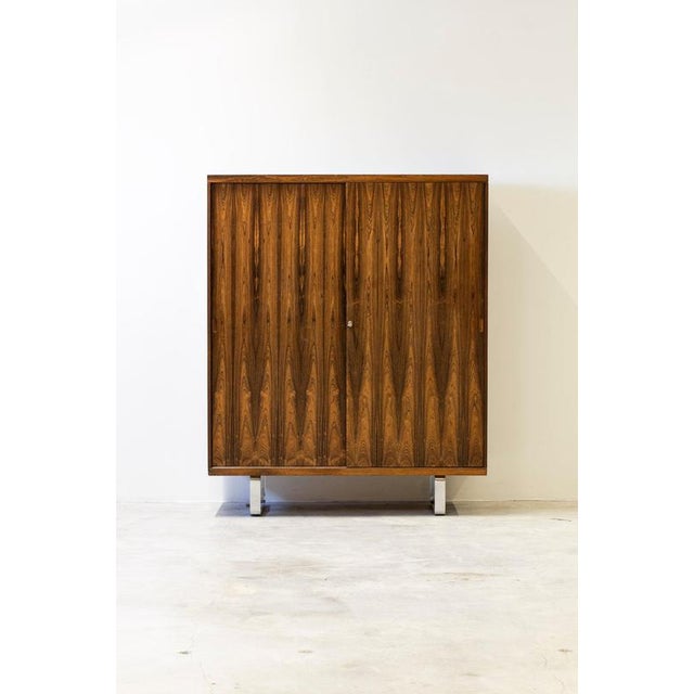 Large cabinet/wardrobe by unknown danish designer and manufacturer. Made around the 1960s. Very nice quality and high...