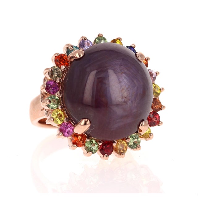 A real statement piece - 37.55 Carat Star Ruby and Multicolored Sapphire Cocktail Ring in 14K Rose Gold This ring has a...