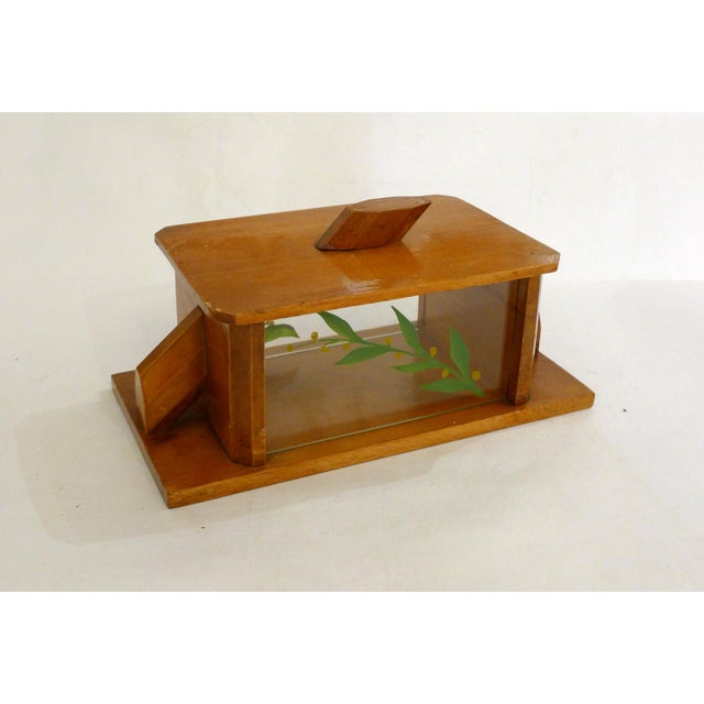 Large Art Deco biscuit tin/candy box; rectangular shape with chamfered corners, wooden base and structure into which...