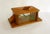 Large Art Deco biscuit tin/candy box; rectangular shape with chamfered corners, wooden base and structure into which...