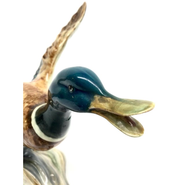 Realistic Mallard Duck ceramic figurine by Beswick. Made in England in the 1950s or 60s. It is in perfect condition where...