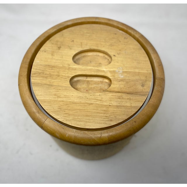 This vintage solid wood ice bucket from Winsome Wood embodies the clean, functional aesthetics of late 20th-century...